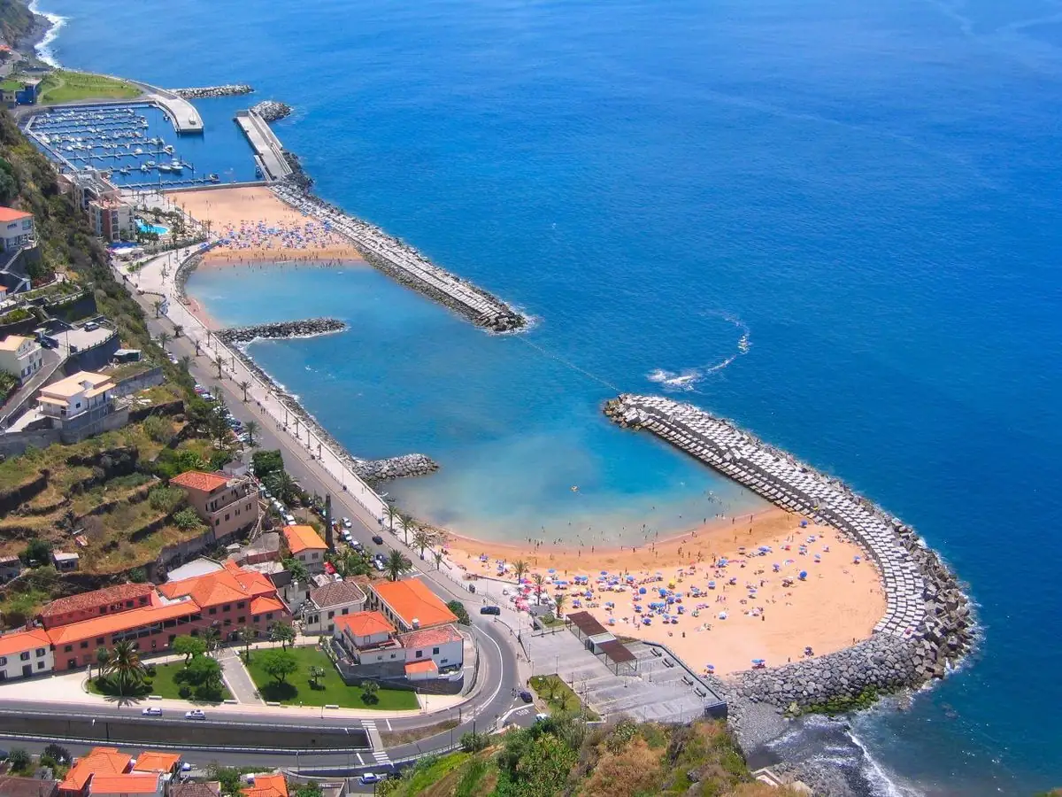 Calheta marina and golden sand beach from above, Madeira