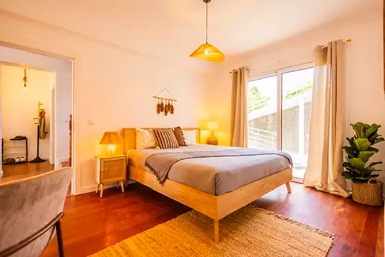 Accessible bedroom with double bed and direct terrace access, Villa Crossdeira Madeira