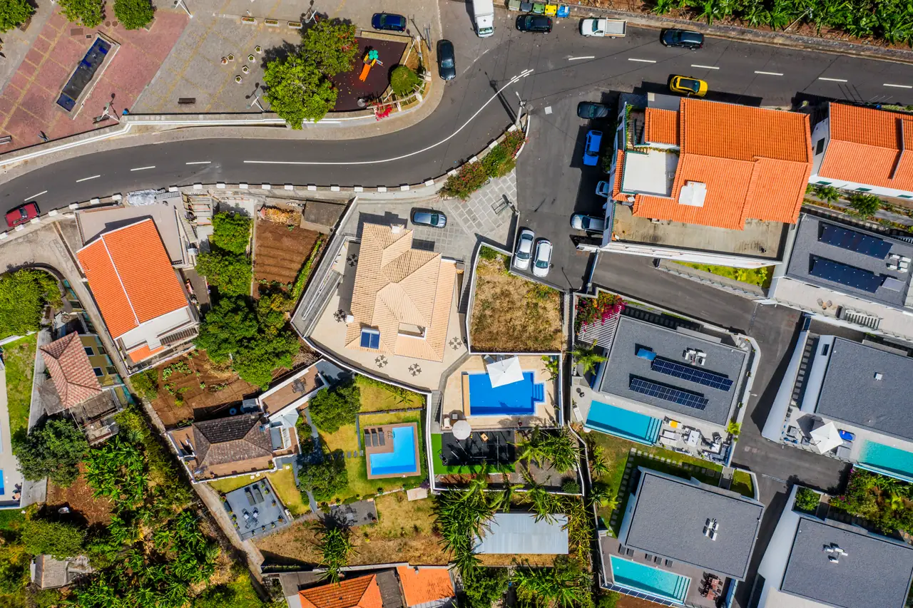Aerial view of Villa Crossdeira and neighbouring houses in Arco da Calheta
