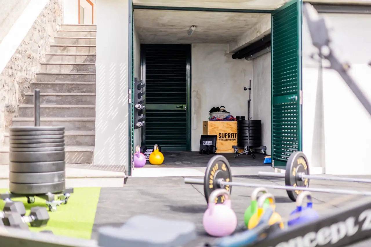 Indoor gym with Suprfit rig, plyo box and kettlebells, Villa Crossdeira