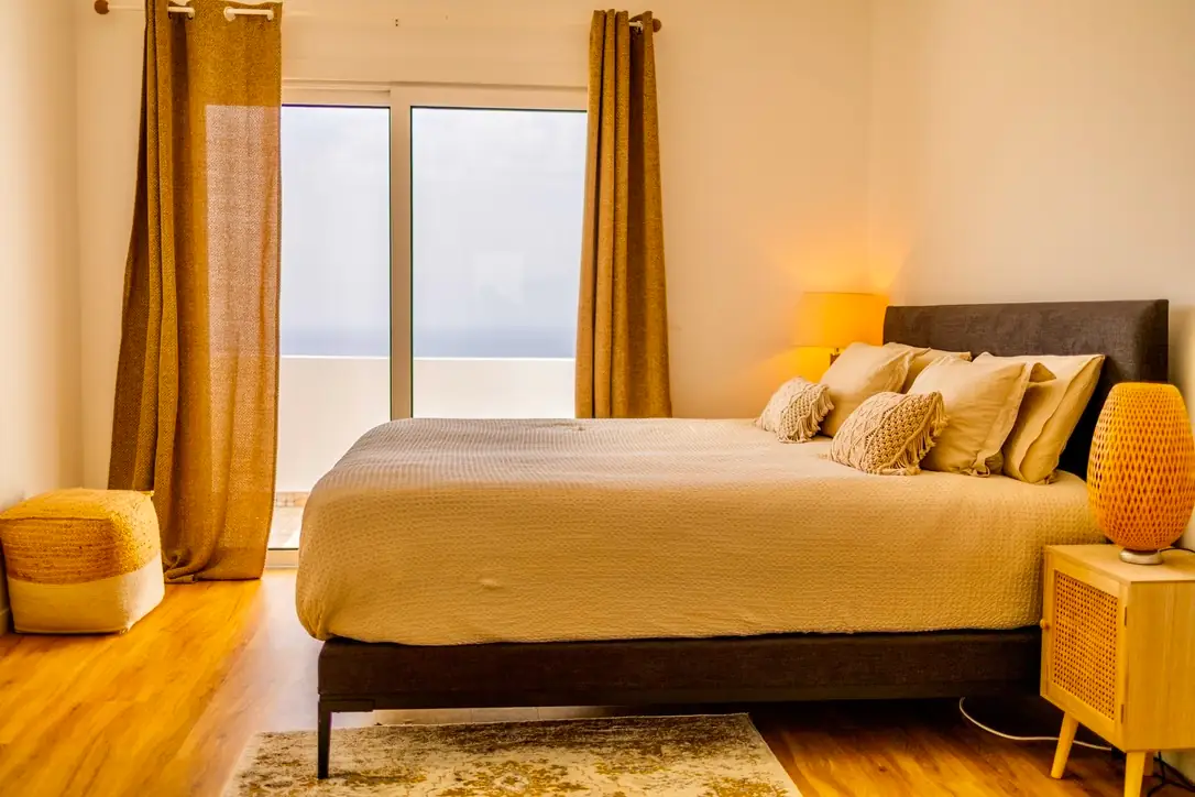 Master bedroom with Atlantic view and morning light, Villa Crossdeira, Arco da Calheta
