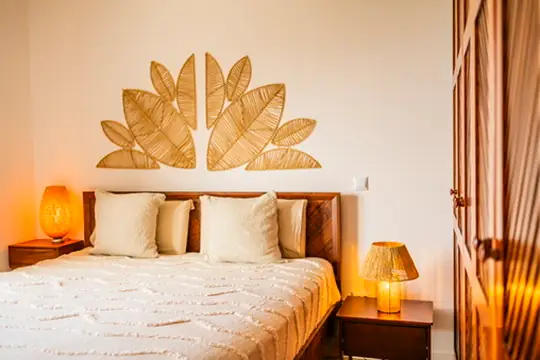 The Ocean Bedroom: double bed with rattan leaf headboard, Villa Crossdeira Madeira