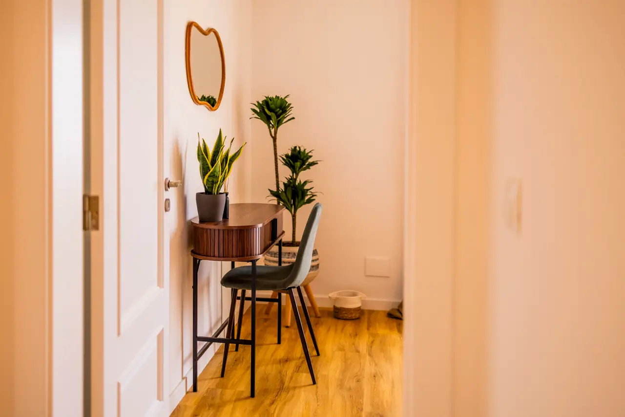 Desk corner and organic-shaped mirror in the Ocean Bedroom, Villa Crossdeira