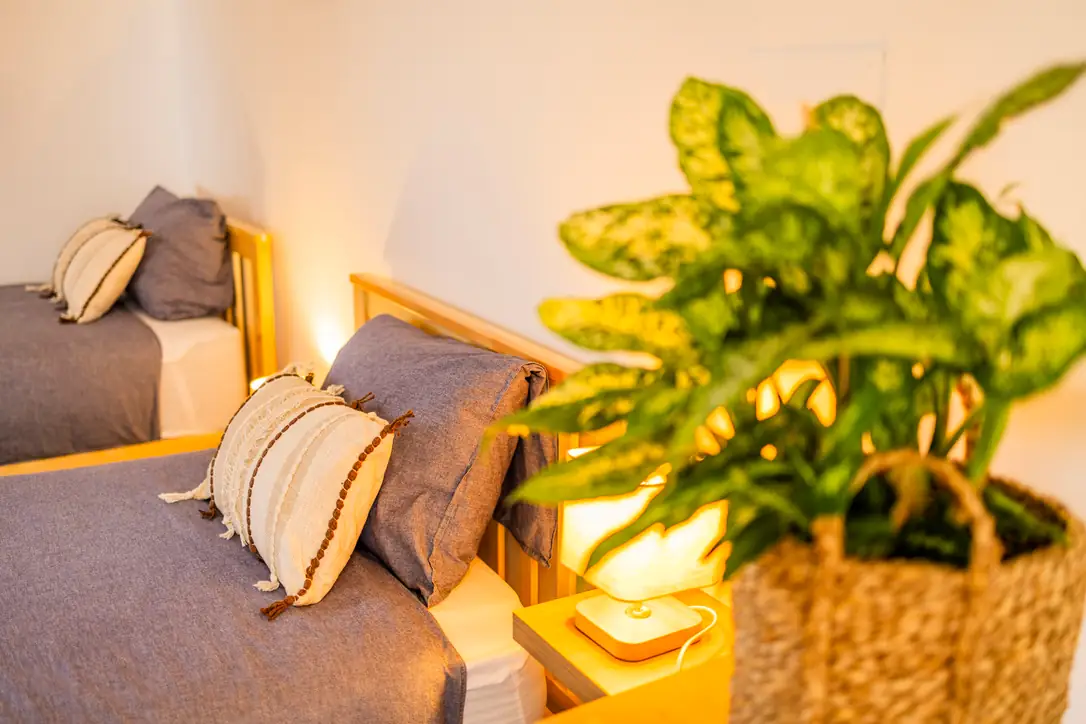 Pillows and bedside lamp in the shared bedroom, Villa Crossdeira